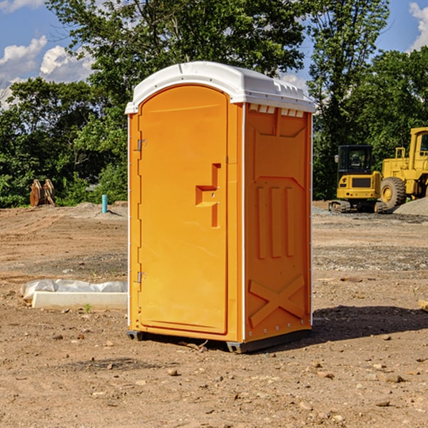 how often are the porta potties cleaned and serviced during a rental period in Seven Fields